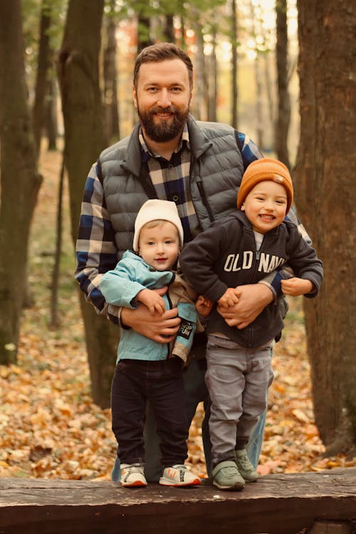 files/free-photo-of-father-with-sons-in-autumn-forest.jpg